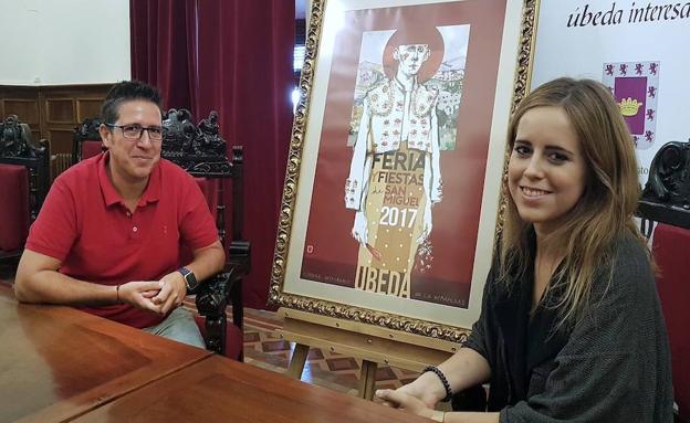 Jerónimo García y Tíscar Espadas con el cartel de feria.